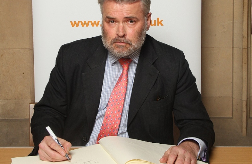 Tim Loughton MP signs Holocaust Educational Trust Book of Commitment  