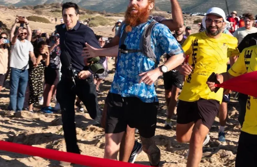 Russ Cook crosses the Tunisian finish line