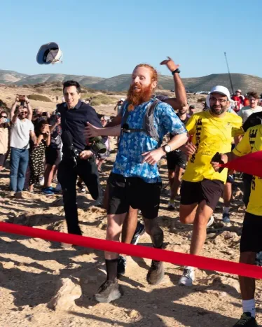 Russ Cook crosses the Tunisian finish line